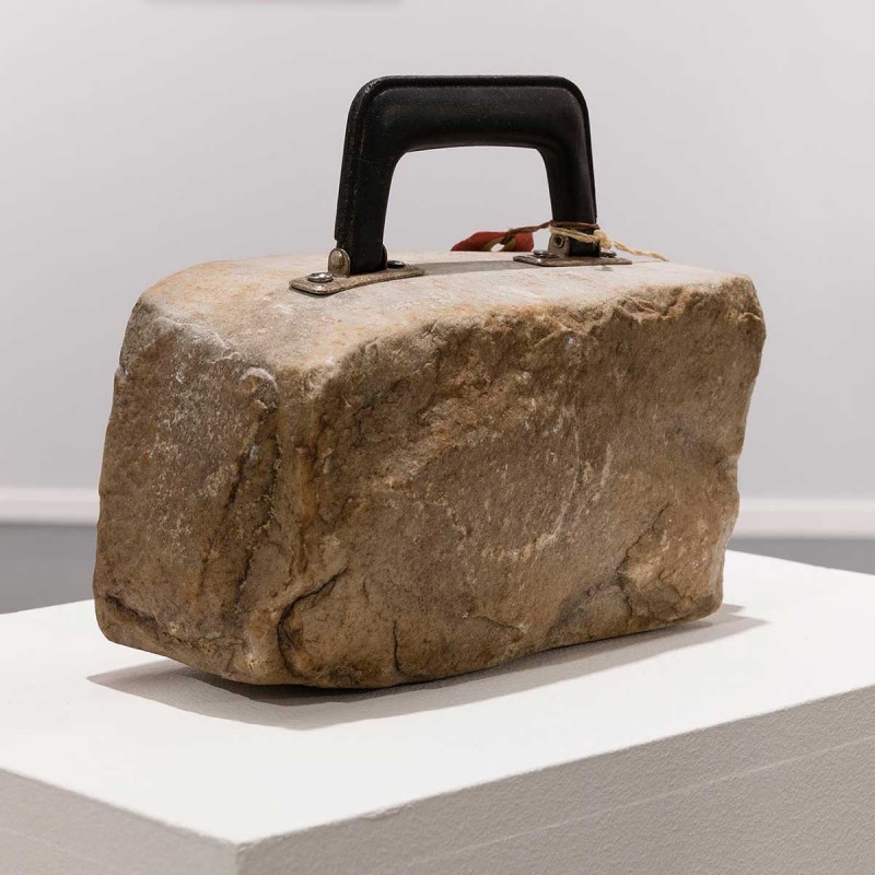 Pavé valise (Laid with cobblestones suitcase), 1970/2021, Esther Ferrer